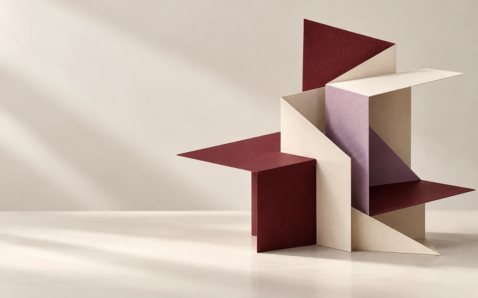 Interlocking burgundy, ivory and lilac paper planes